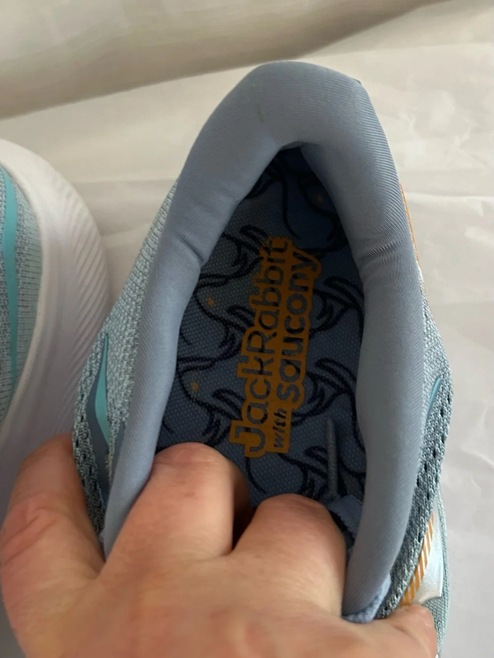 Saucony Ride 15 Women's Light Blue Athletic Sneakers with Yellow Accents